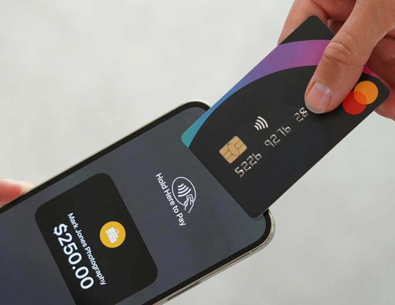Contactless credit card payment for photography session using smartphone tap-to-pay feature