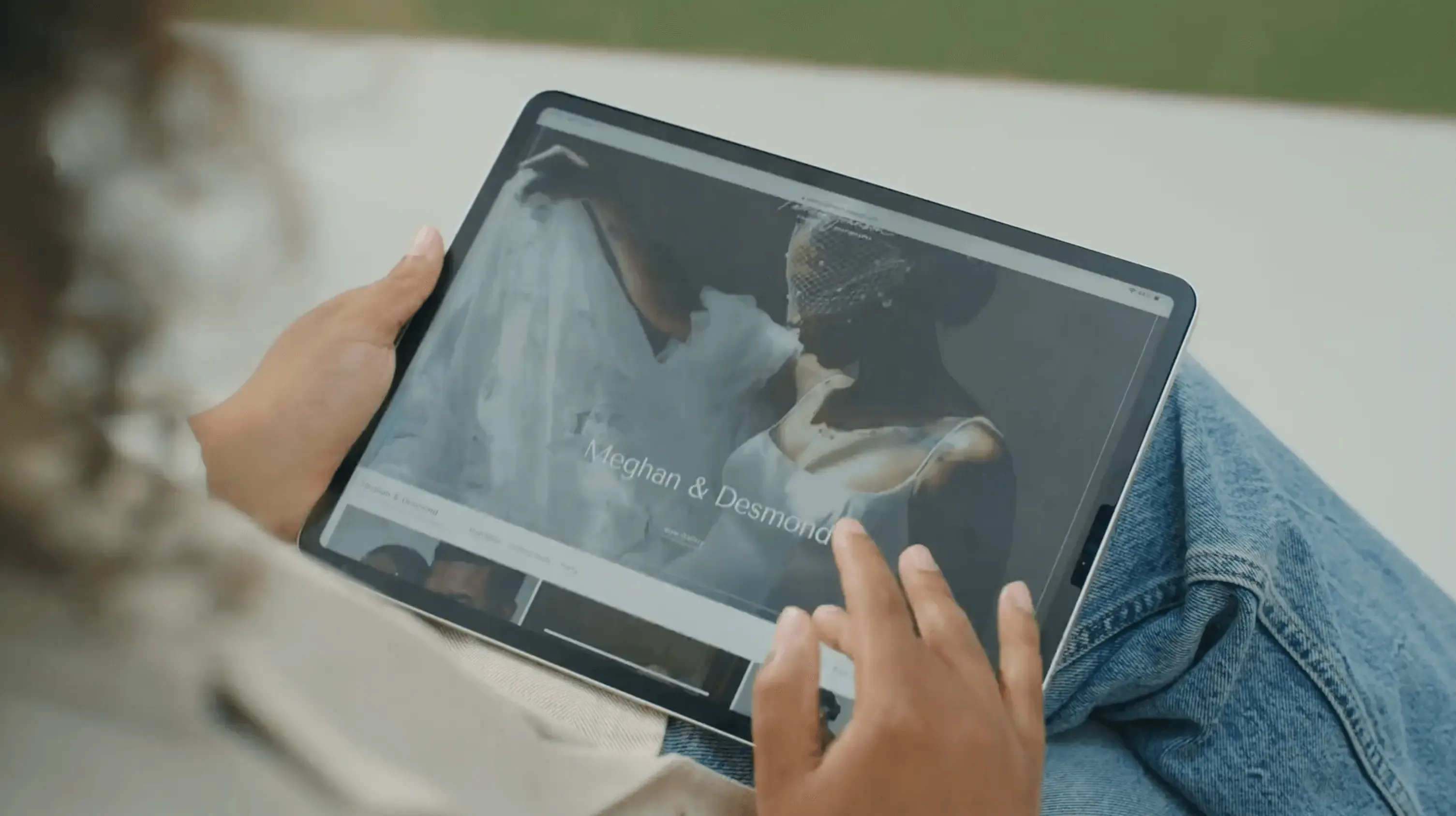 Photographer reviewing Pixieset wedding client gallery album of Meghan and Desmond.